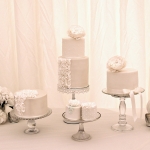 white ruffles wedding cake table